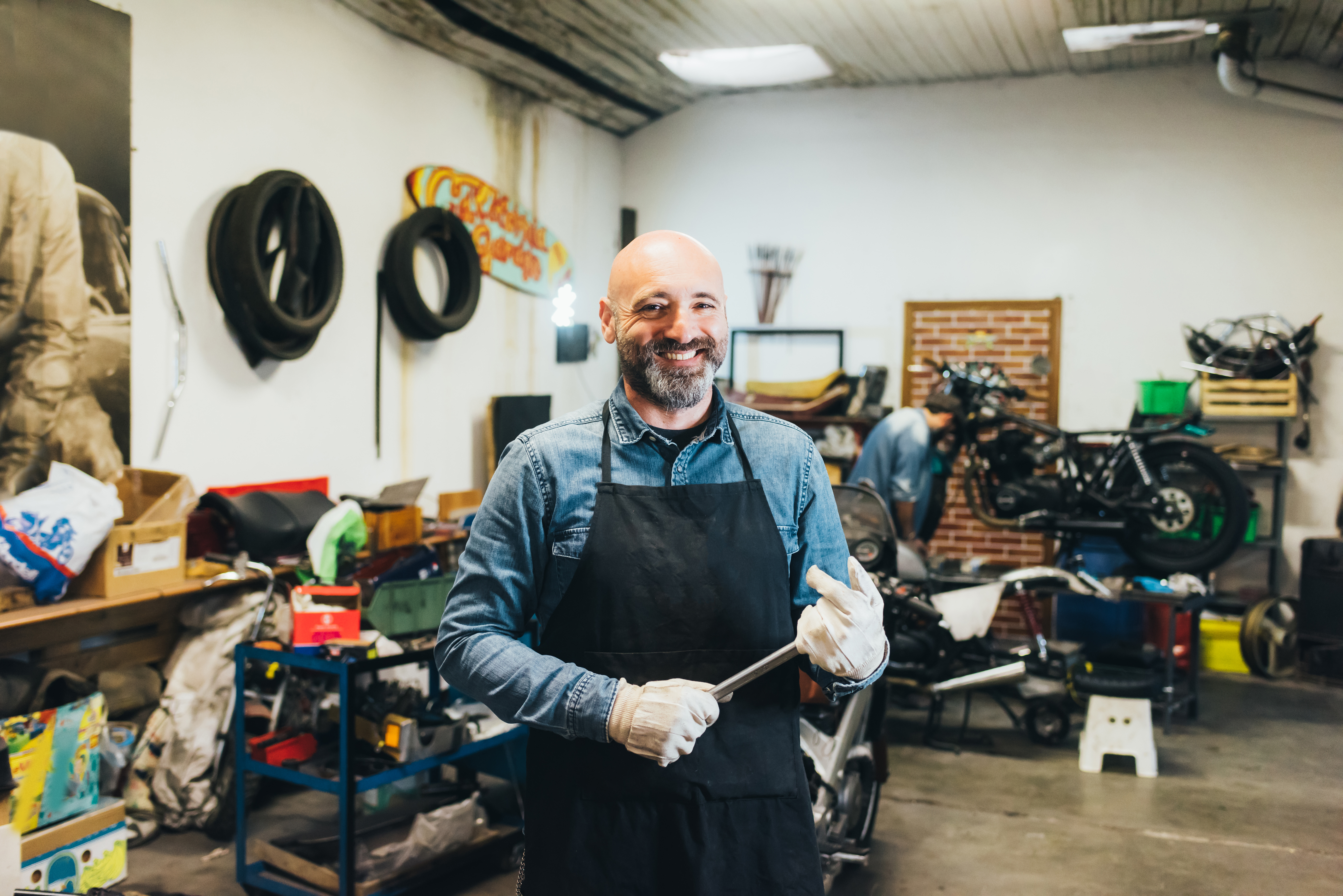 Portrait of mature man, in garage